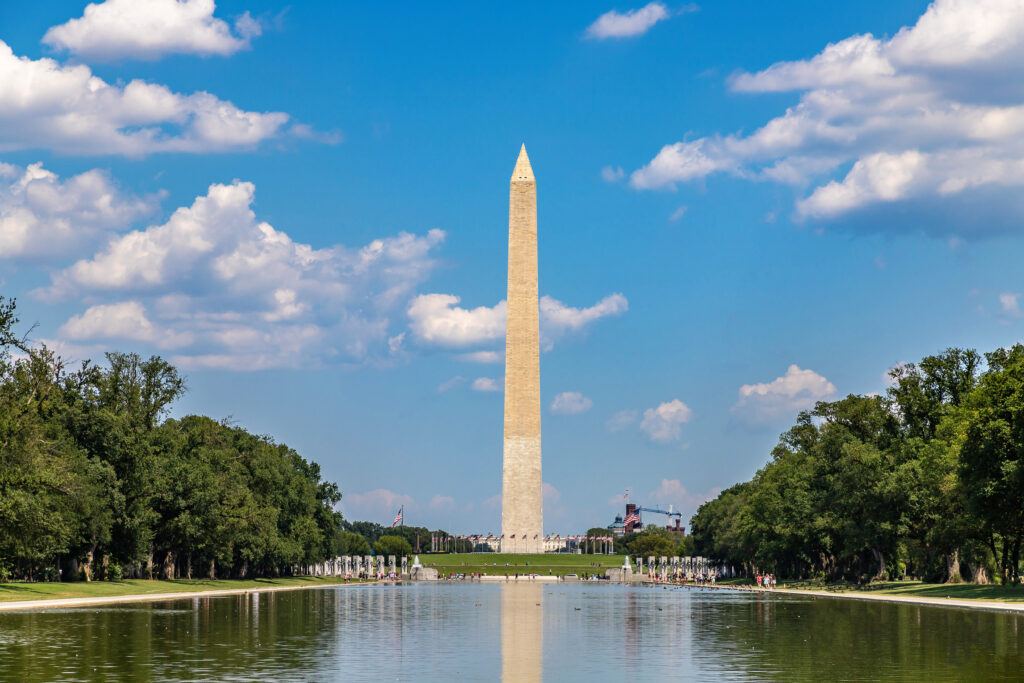 The Washington Monument reflected in a serene pond in Washington DC.