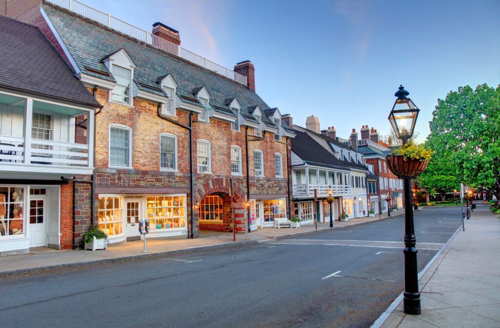 A picturesque street in Palmer Square, Princeton, New Jersey, featuring a charming lamp post and an elegant building.