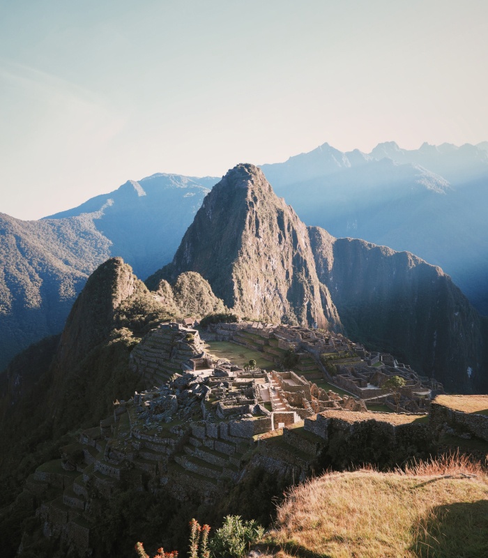 a stone ruins on a mountain