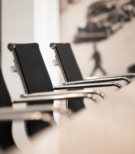 a group of chairs in a conference room