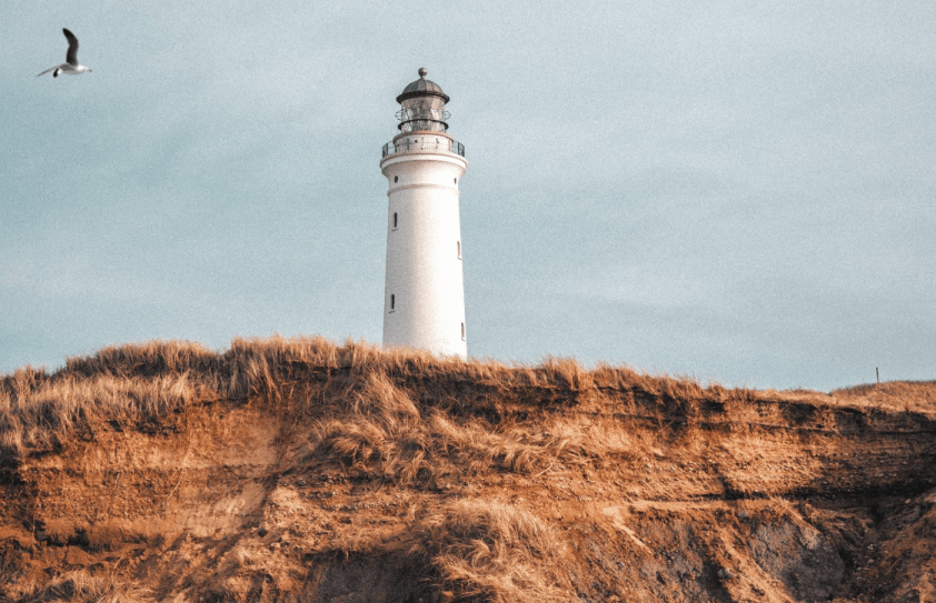 Lighthouse with grey sky in background