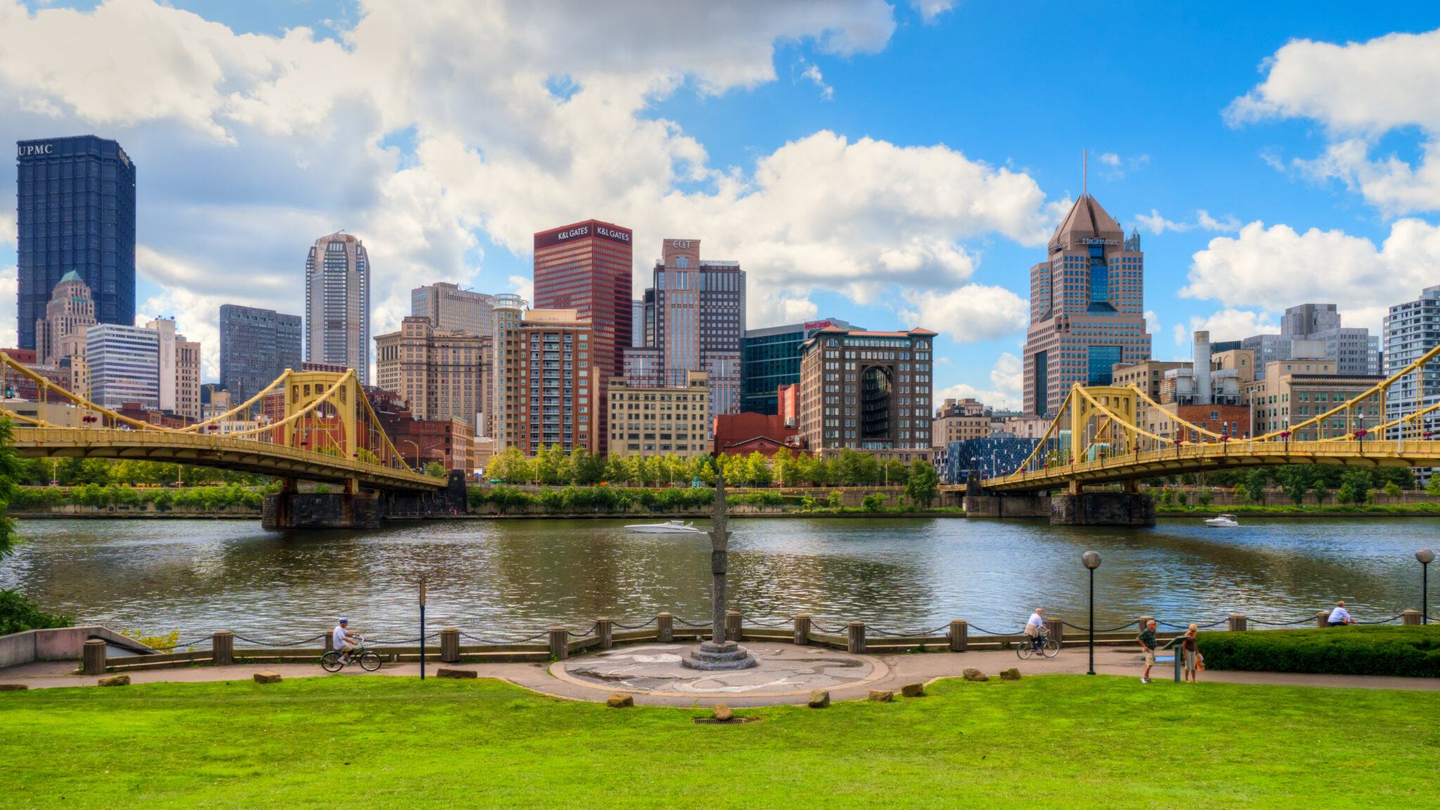 Sunny skyline view of downtown Pittsburgh as seen between the Andy Warhol Bridge and the Roberto Clemente Bridge