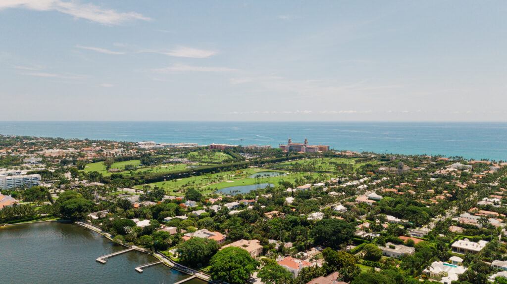 Aerial Drone View of the Waterfront Inlet in Downtown West Palm Beach, Florida; Palm Beach at Midday in June 2022